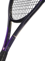 Close-up studio shot of a tennis racket showing the black and purple frame, black strings, and part of the grip against a white background. Visible branding includes HEAD logo.